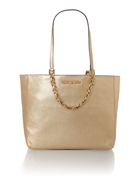 Michael Kors gold tote bag